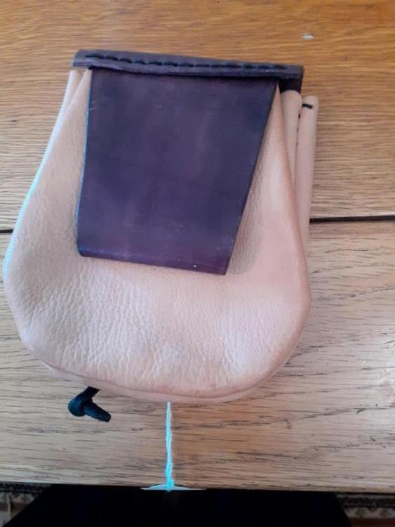 .pouch small button closure back